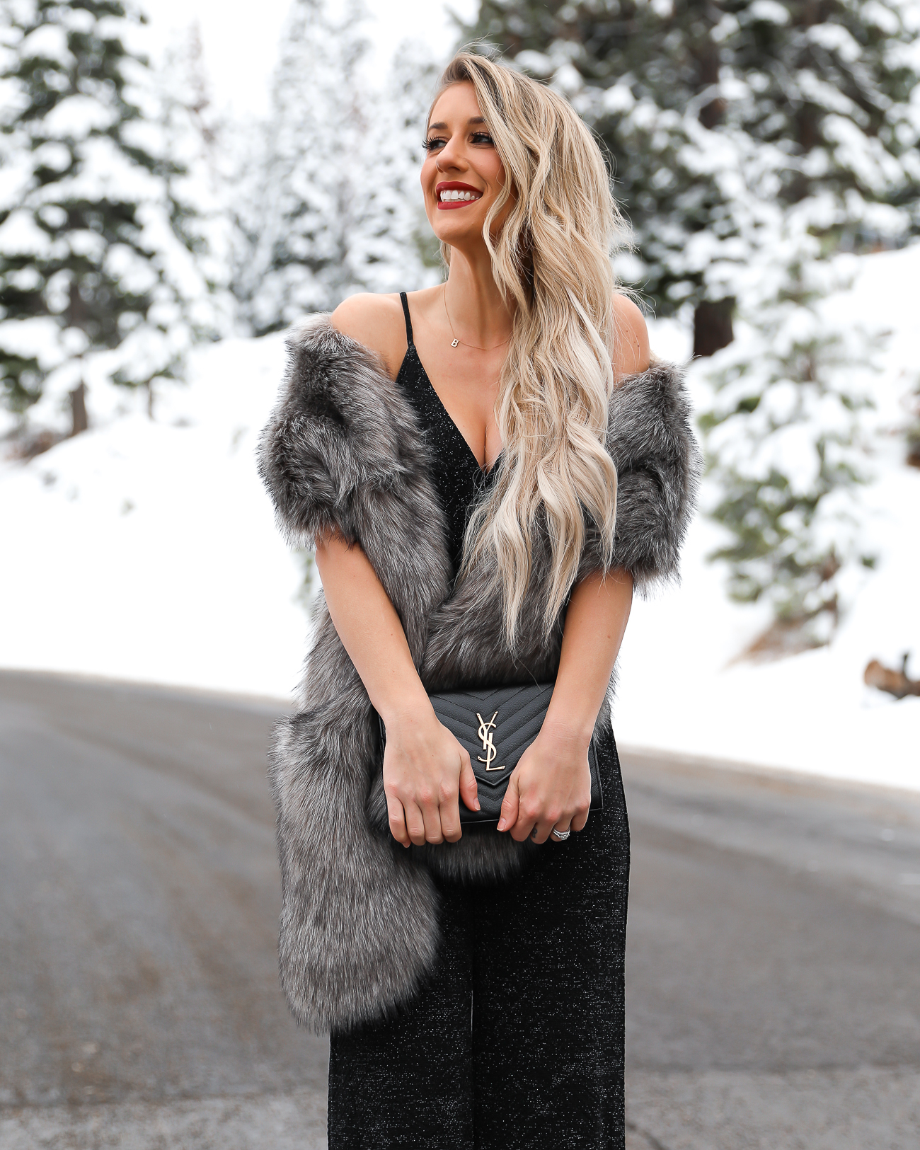 Nordstrom Black Christmas Holiday Sparkle Jumpsuit Faux Fur Scarf wrap Black YSL monogram wallet on a chain Lake Tahoe Winter Outfit Laura Beverlin -5