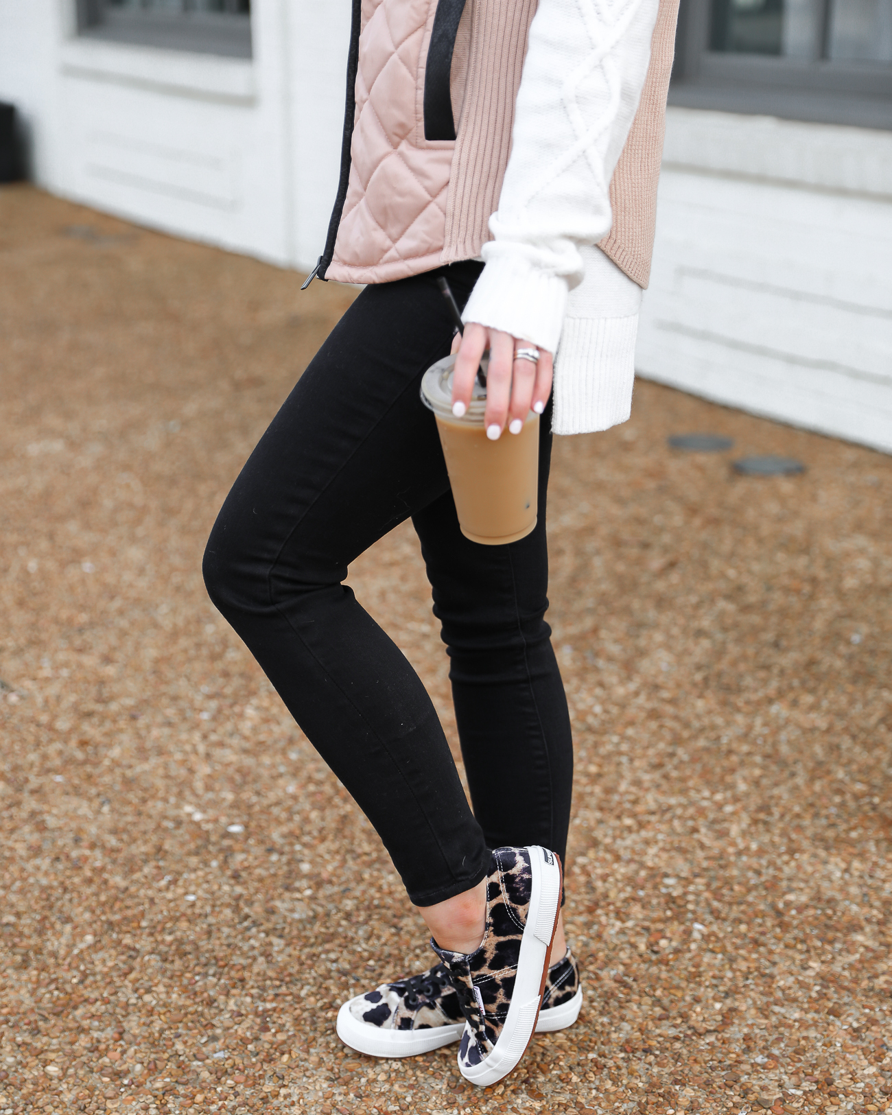 Walmart Tan and Black Quilted Vest Superga leopard velvet sneakers Black skinny jeans White knit tunic sweater Lord & Taylor Laura Beverlin-10