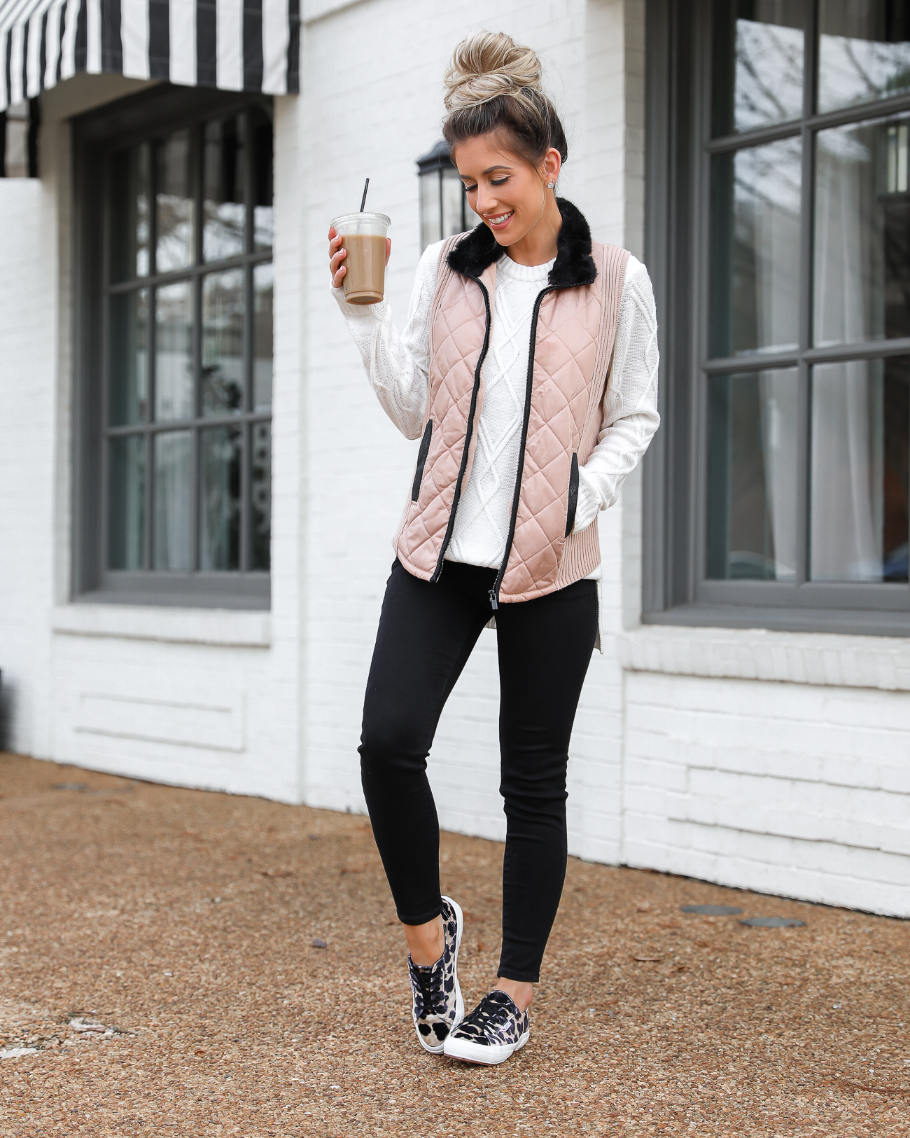 Walmart Tan and Black Quilted Vest Superga leopard velvet sneakers Black skinny jeans White knit tunic sweater Lord & Taylor Laura Beverlin