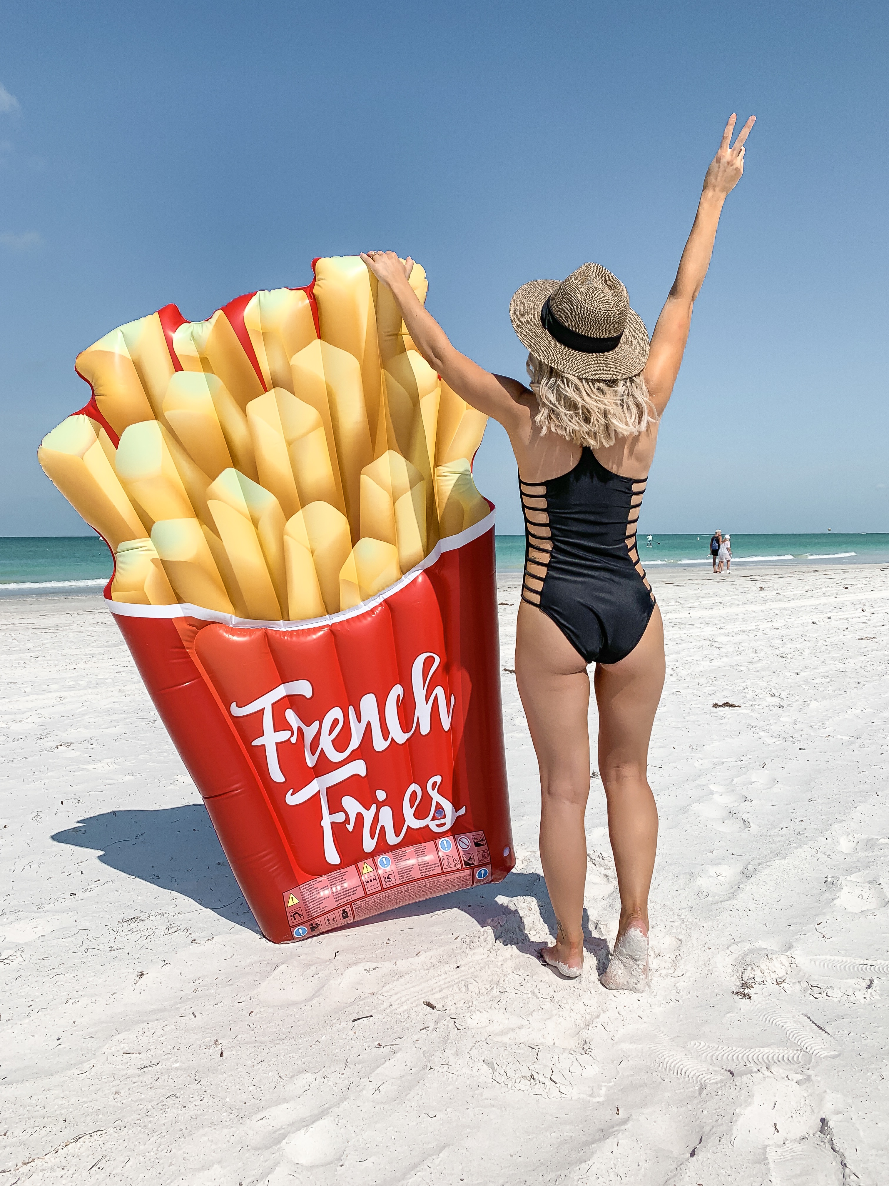 french fry pool beach float black cutout one piece swimsuit Laura Beverlin St Pete beach florida