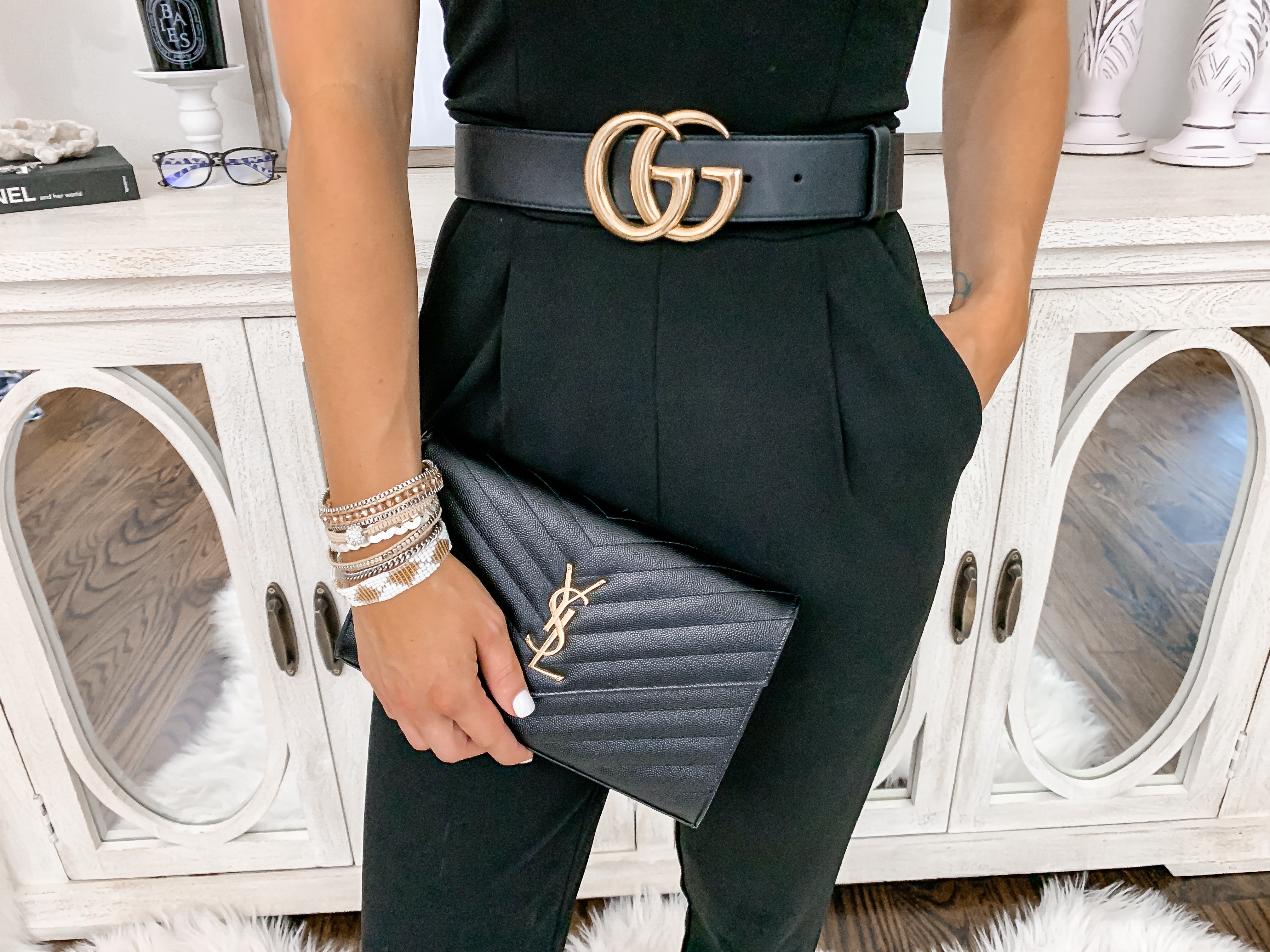 Date night outfit idea black jumpsuit victoria emerson wrap bracelets laura beverlin