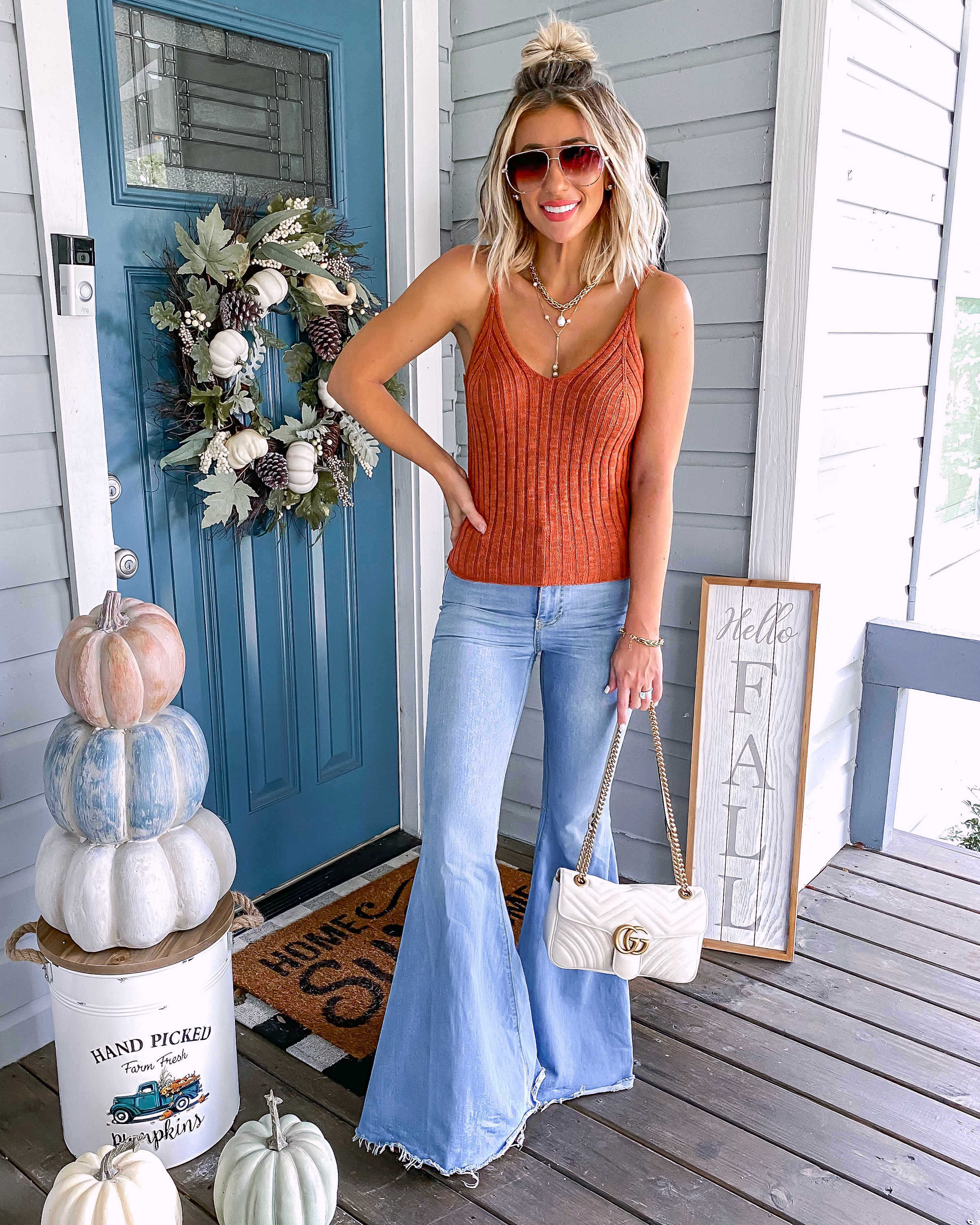 Fall Outfit Idea Flare Jeans Sweater Tank Laura Beverlin1